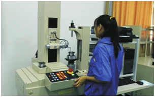 Ruiding official QC photograph labelled Osaka Precision CNC automatic gear measuring instrument, showing an operator taking a measurement